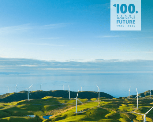 windmills on green hills