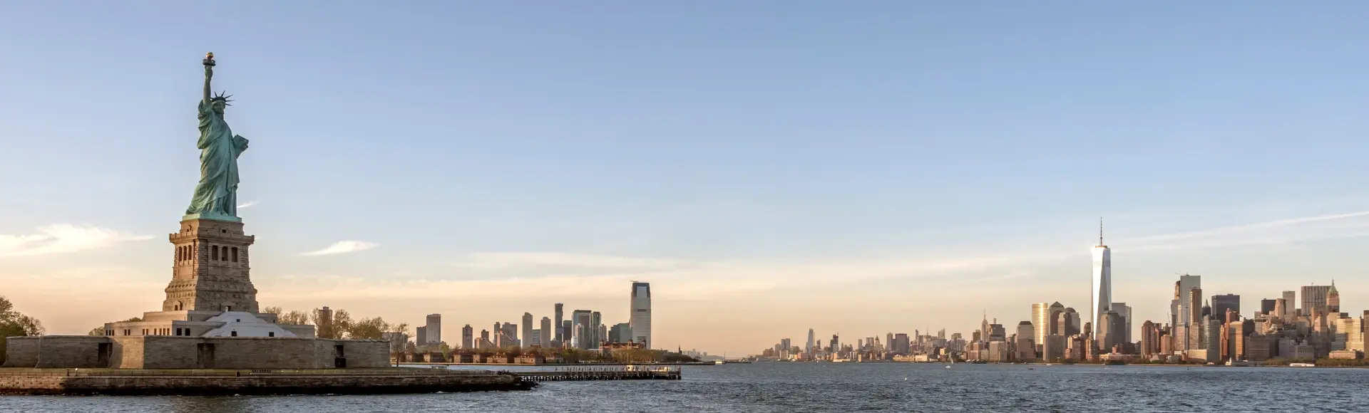 Statue of liberty in front of New York city
