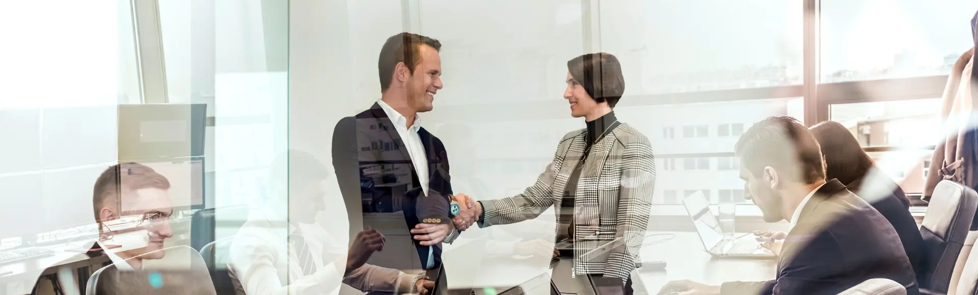 HSE manager shakes hands with colleague
