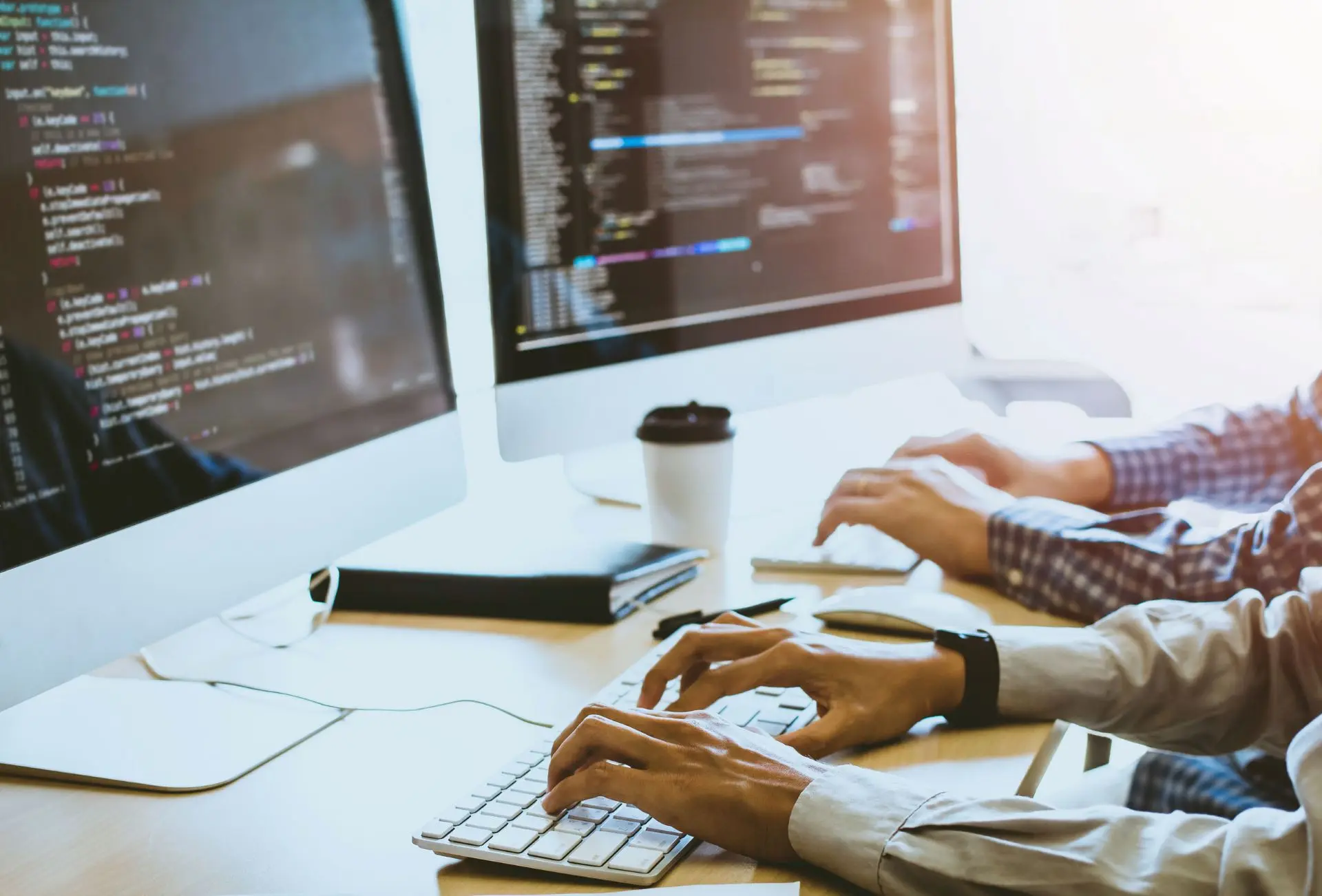 Two persons CCV pentesting on one desk