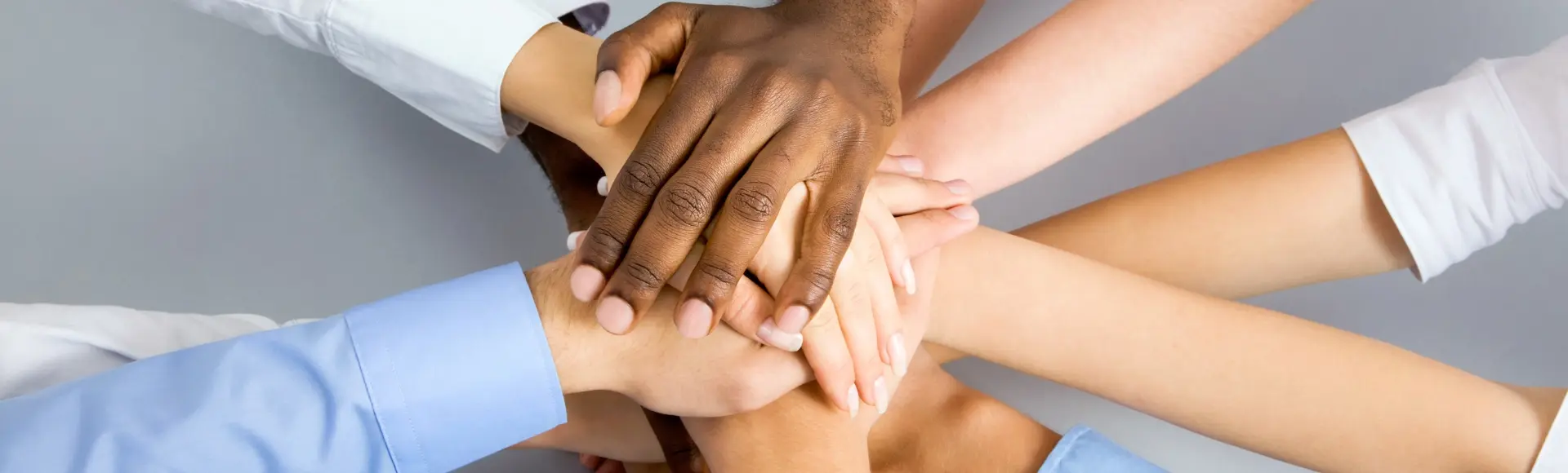 people laying their hands on the others hands people laying their hands on the others hands