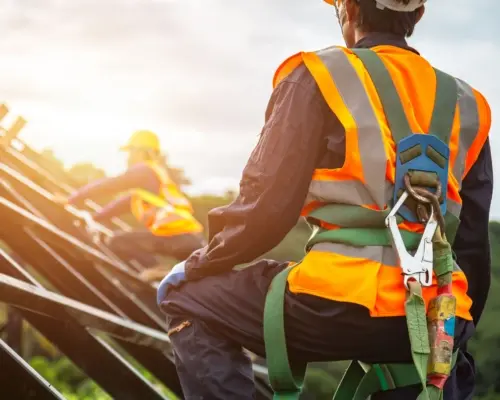 construction workers working on a roof