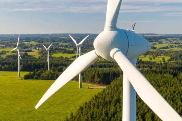 Windturbine park on green fields and forests Windturbine park on green fields and forests