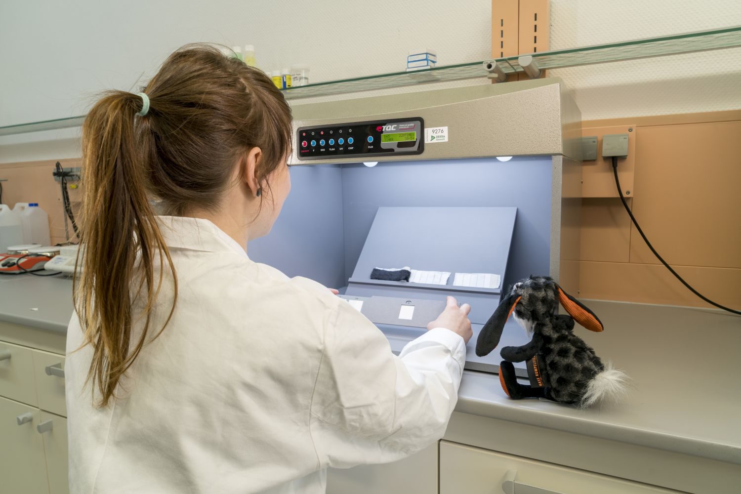  Alexandra Kirchner, DEKRA Laboratory in Halle, examines the test strips under a daylight lamp