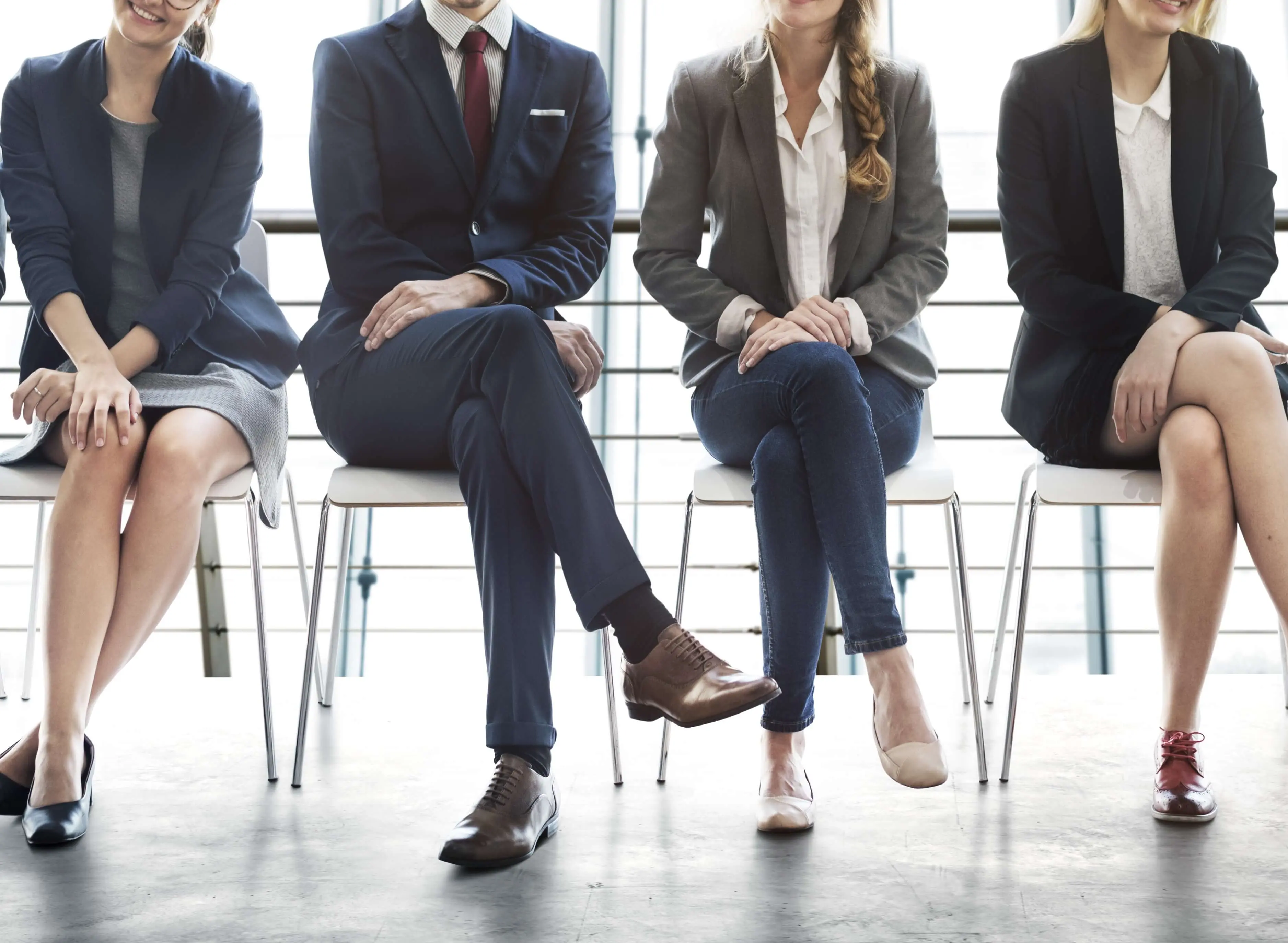Four applicants sitting and waiting