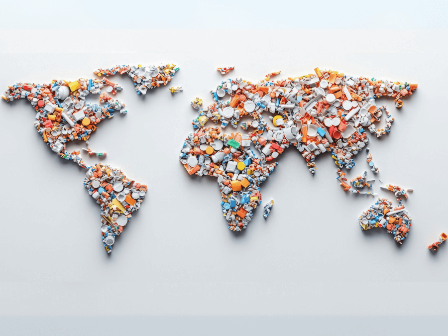 A world map on a white background made from plastic waste