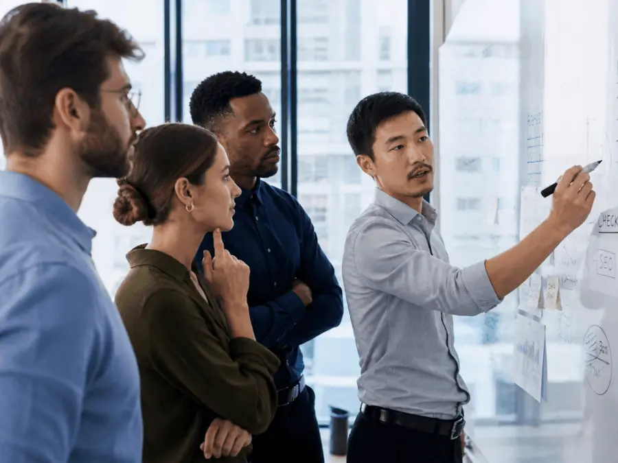 Visit our Career Portal Employees talking and discussing