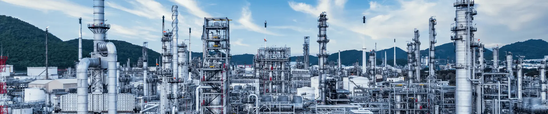 Large chemical processing plant with industrial towers and pipelines