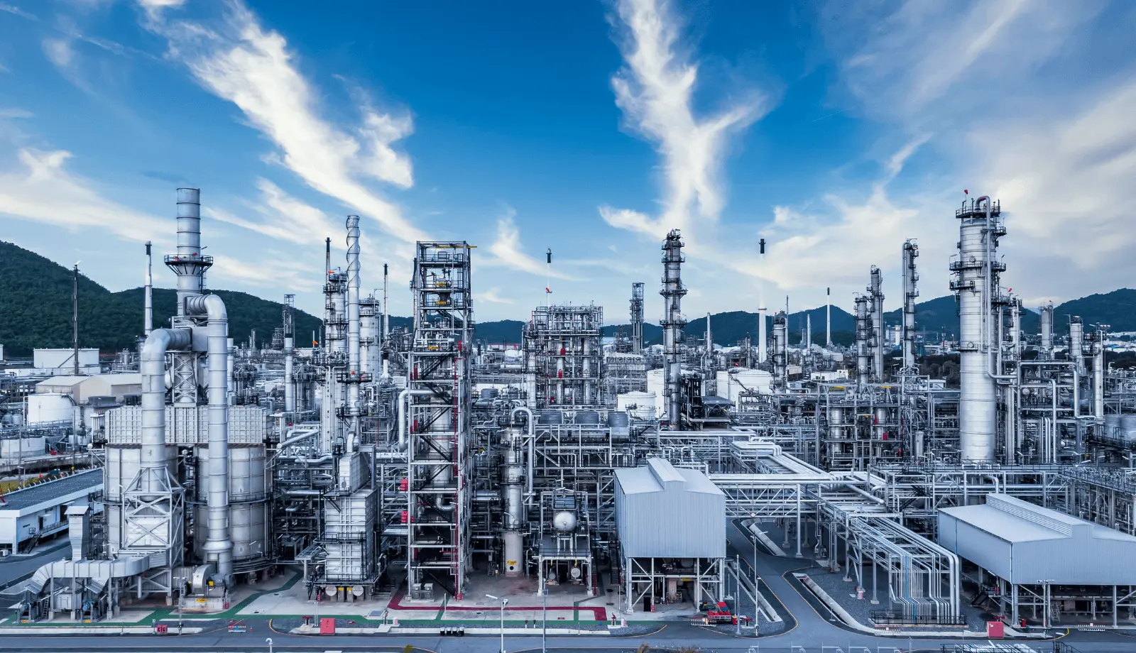 Large chemical processing plant with industrial towers and pipelines