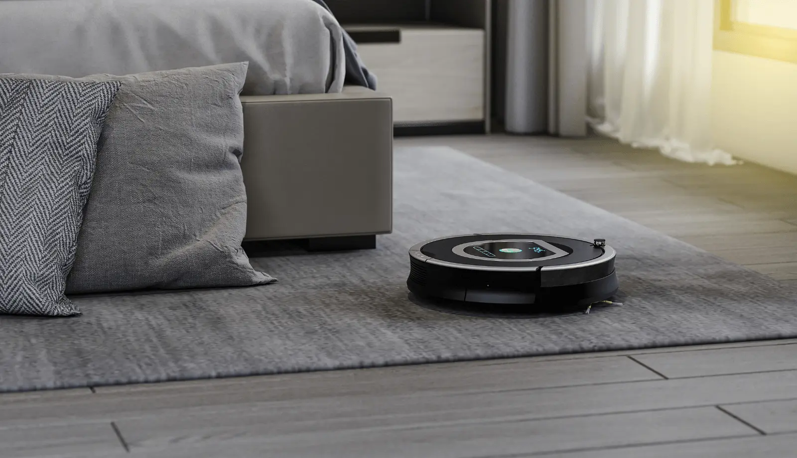 Robot vacuum cleaner on carpet in living room floor