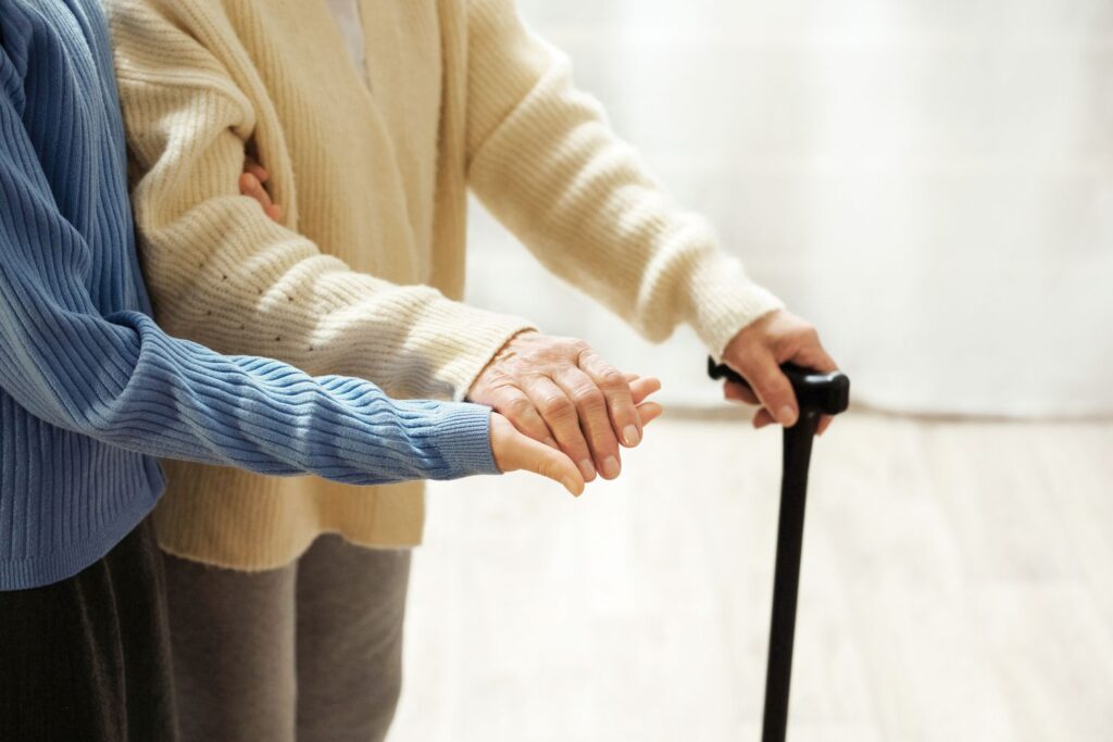 seniors holding hands