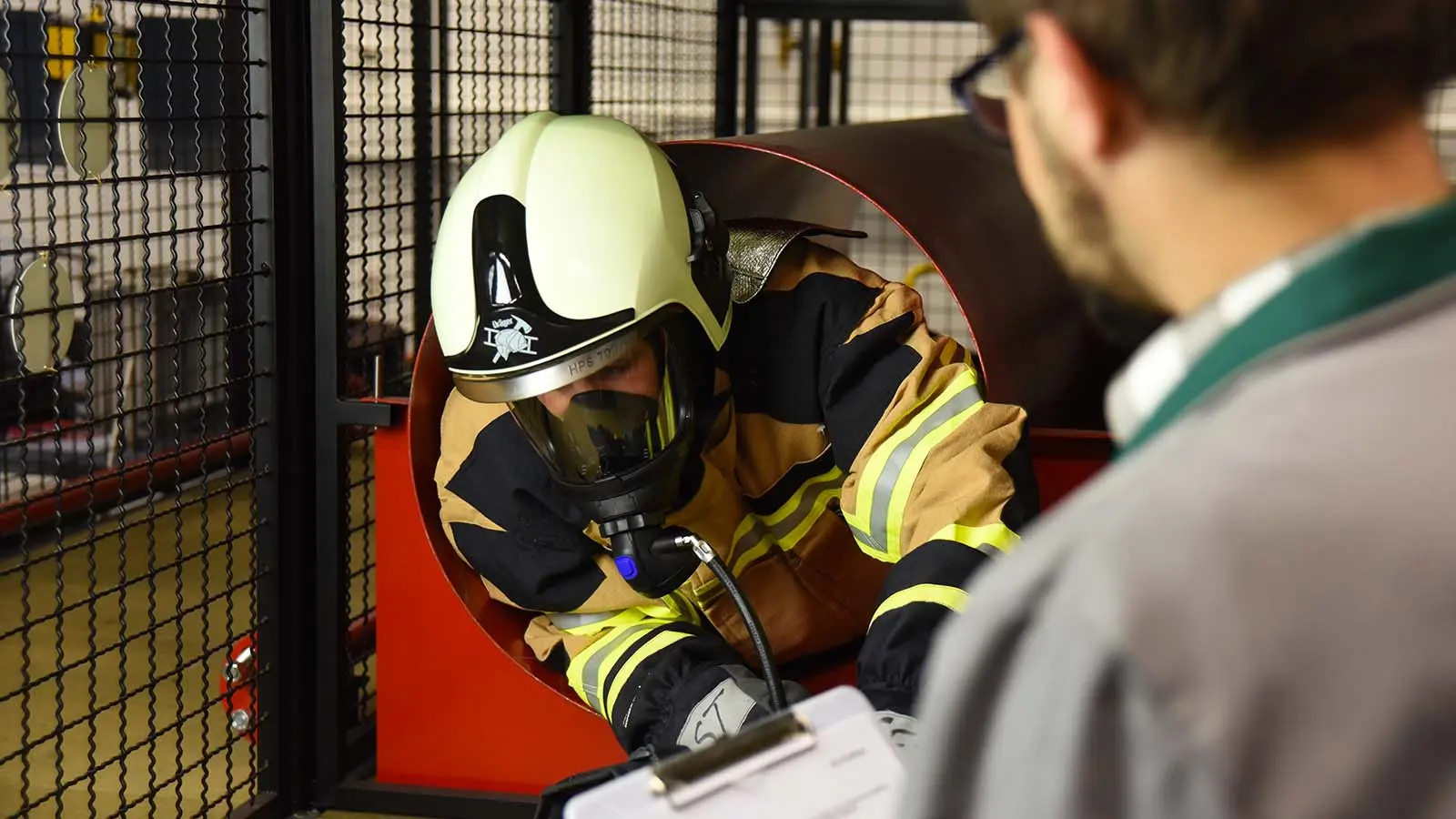 Firefighter with breathing apparatus during a test exercise