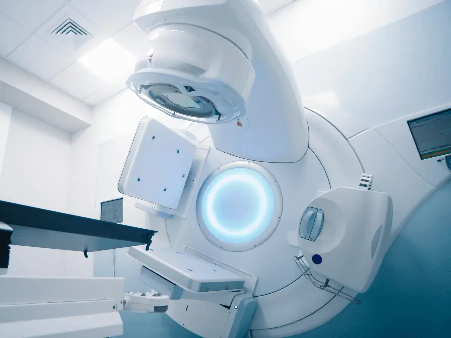 Radiotherapy treatment room with advanced cancer treatment technology and precision equipment for patient care