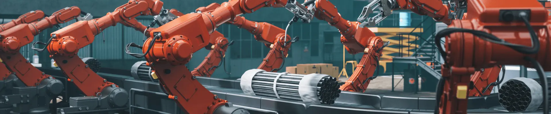 Industrial robotic arms operating on a production line Industrial robotic arms operating on a production line