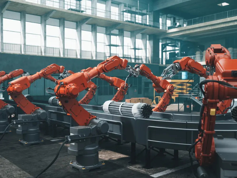 Industrial robotic arms operating on a production line
