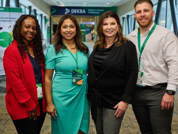 Andra Brown, Nadia Huda, Angelica Grindle, and A.J. Rodriguez organize the Safety in Action Conference. DEKRA Safety in Action