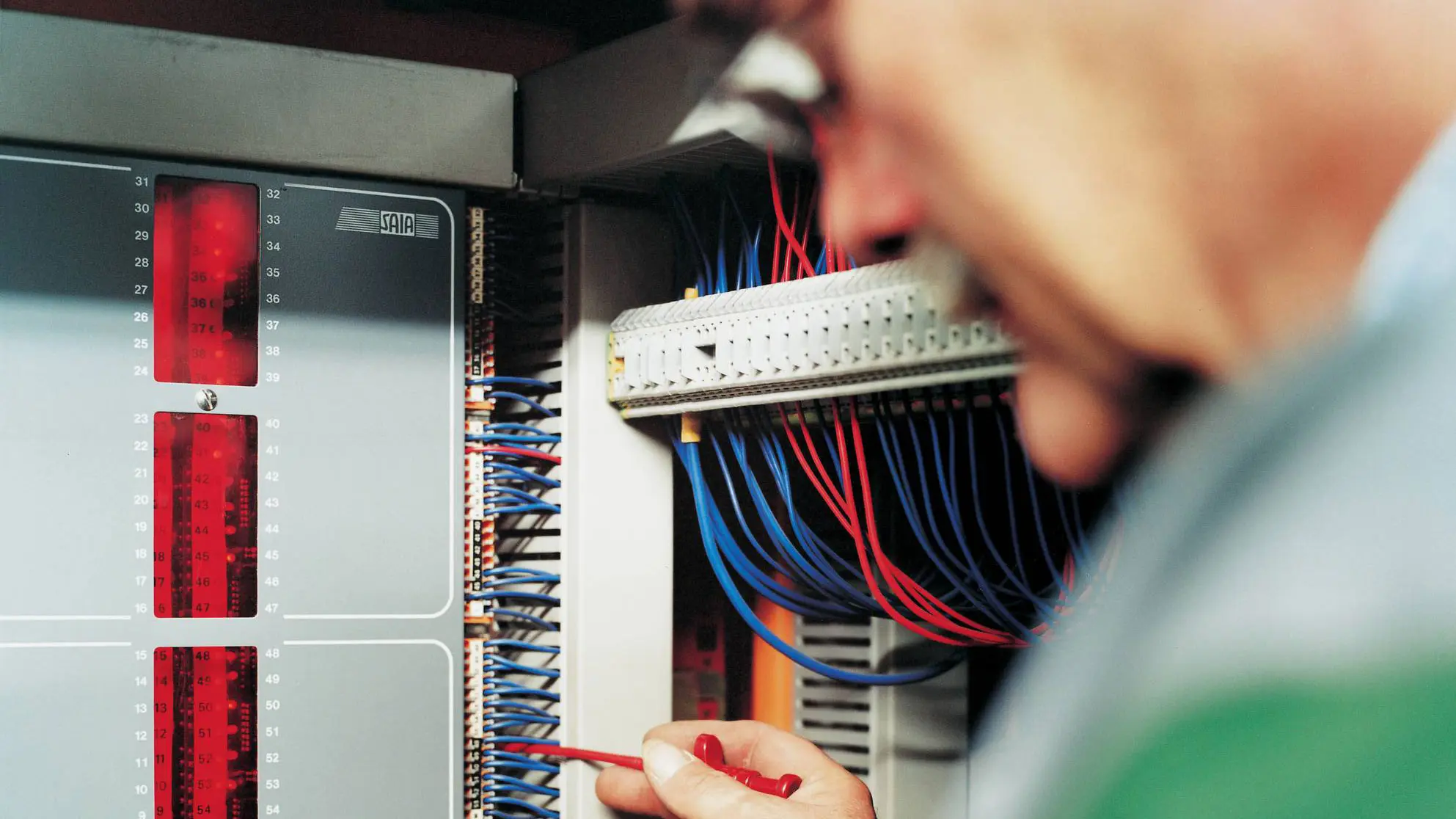 Expert inspecting cables
