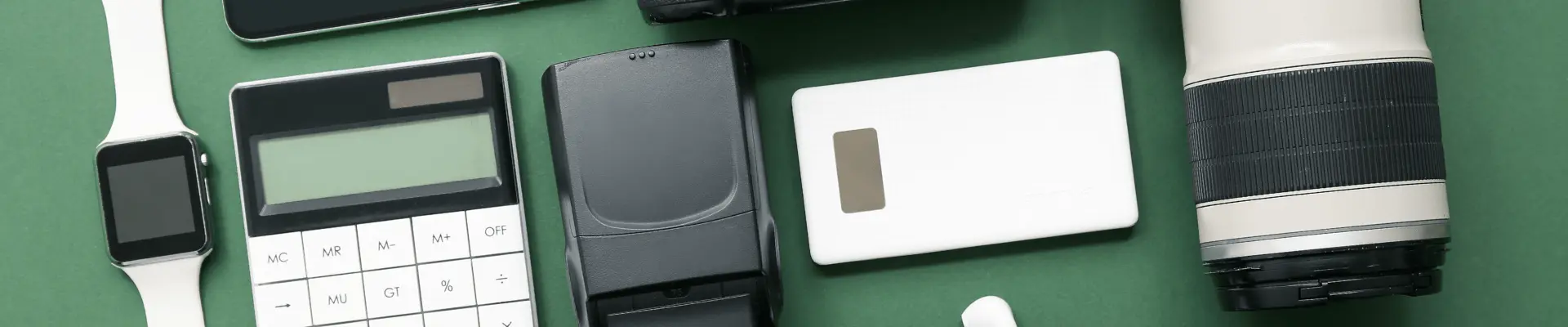 Flat lay of electronic devices and accessories, representing retail and wholesale industry.
