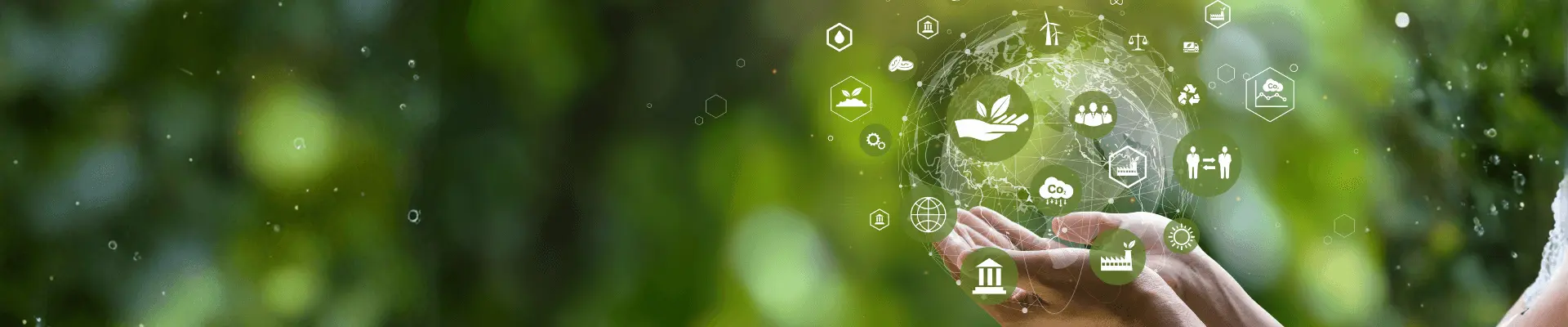 Hands holding a globe with ESG symbols representing environmental, social and governance responsibility on a green background