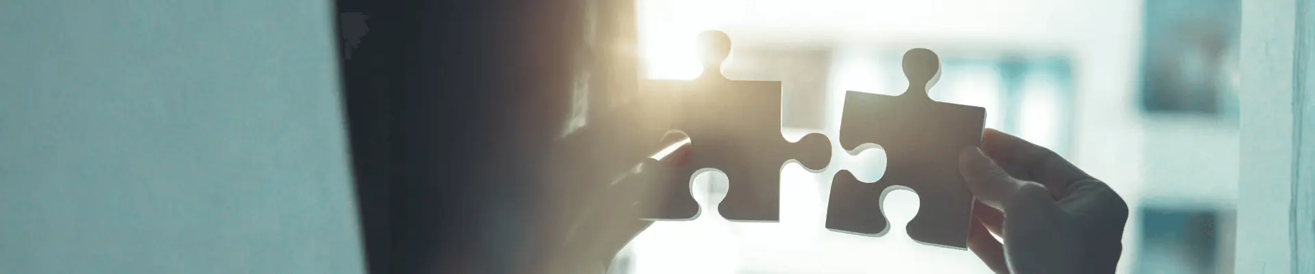 puzzle pieces with a focus light in the middle