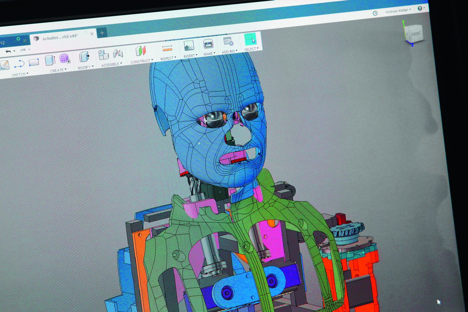 The humanoid robot is programmed so that the motors can take over the repertoire of movement of its human model