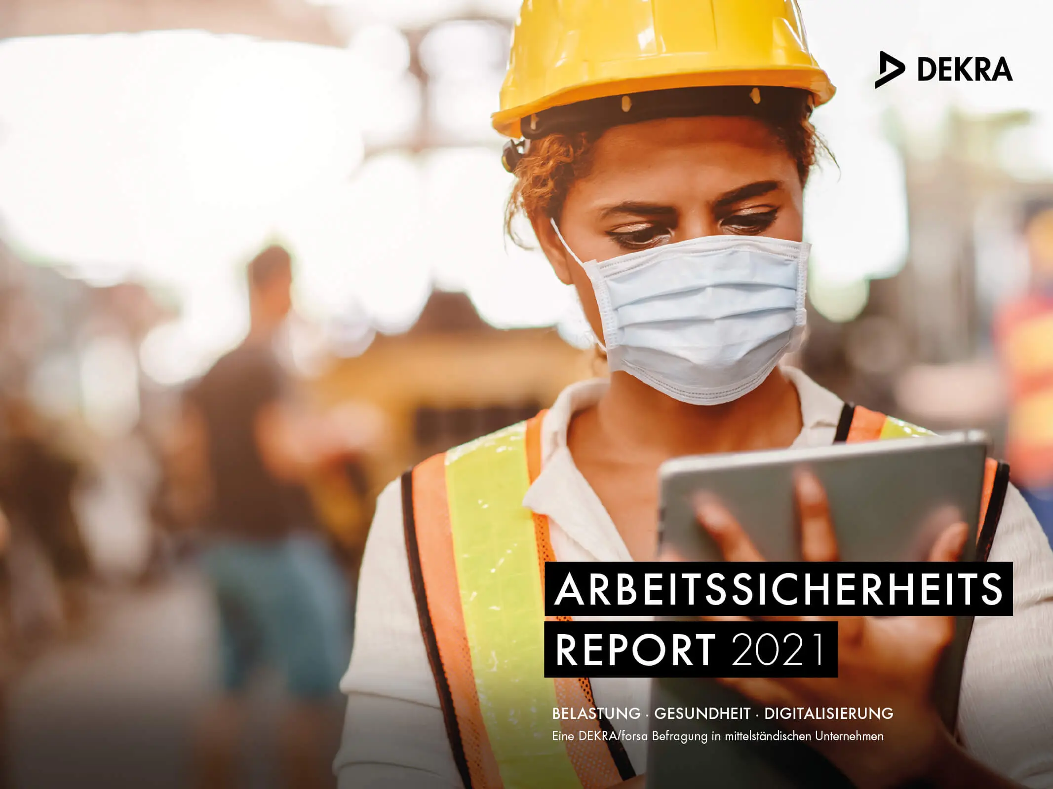 Person mit Atemmaske und Sicherheitskleidung