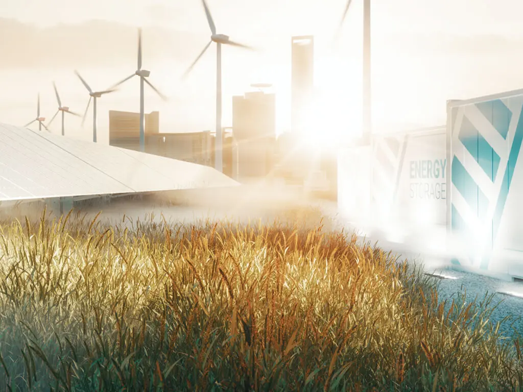 Person sitzt auf Windkraftanlage