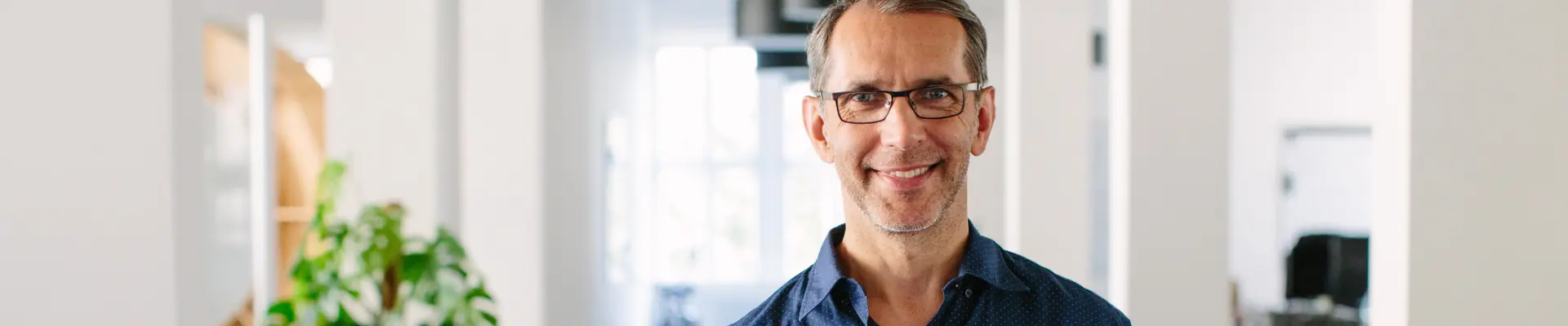 man smiling at the camera