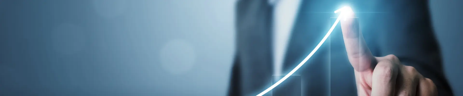 Businessman in a suit interacting with a digital chart showing positive growth and increasing performance.