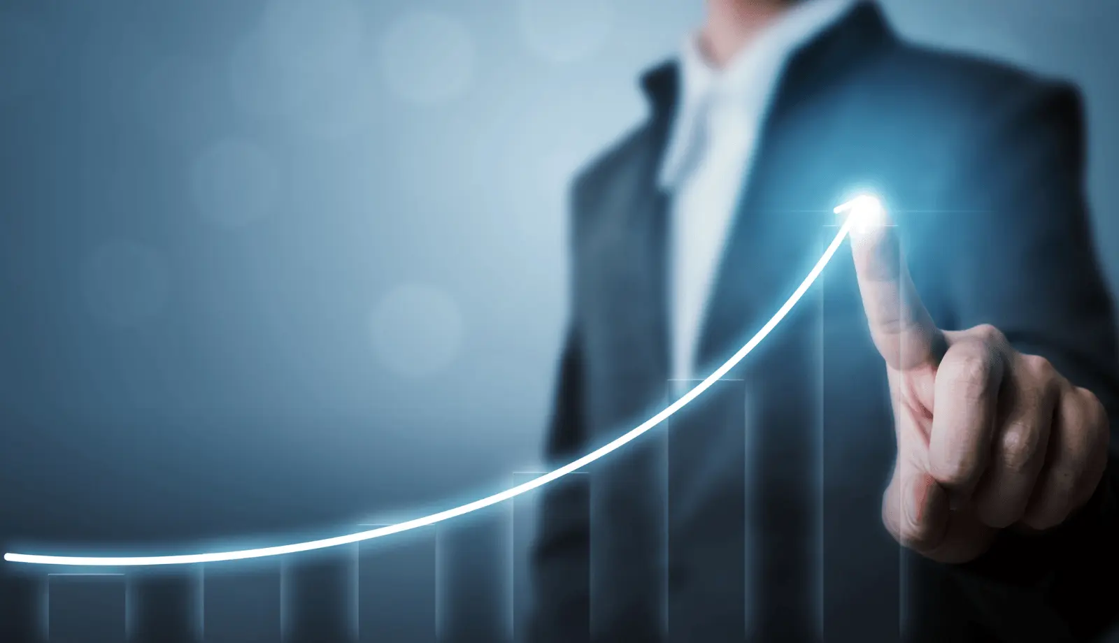 Businessman in a suit interacting with a digital chart showing positive growth and increasing performance.