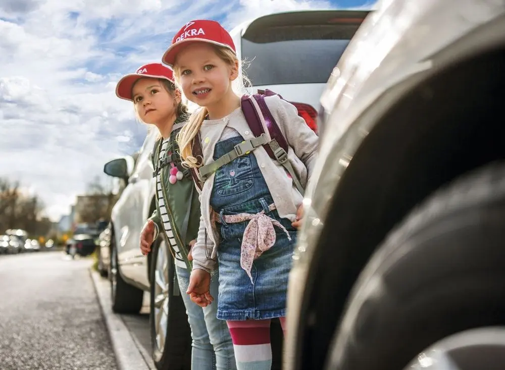Children between cars