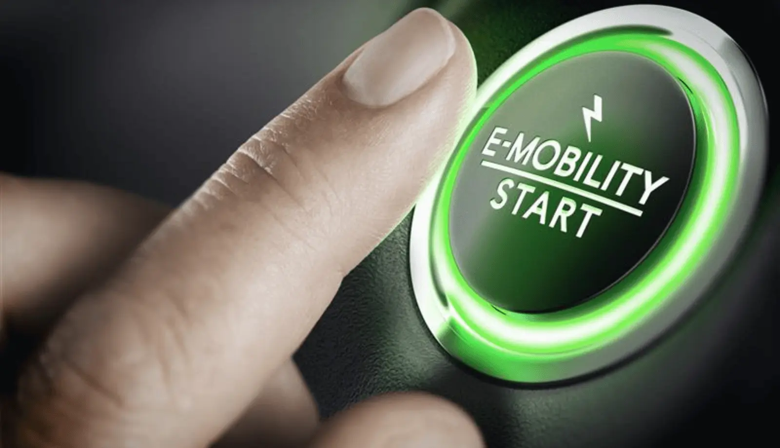 A finger about to press a green 'E-Mobility Start' button