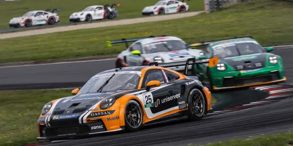  Porsche racing cars on the racetrack