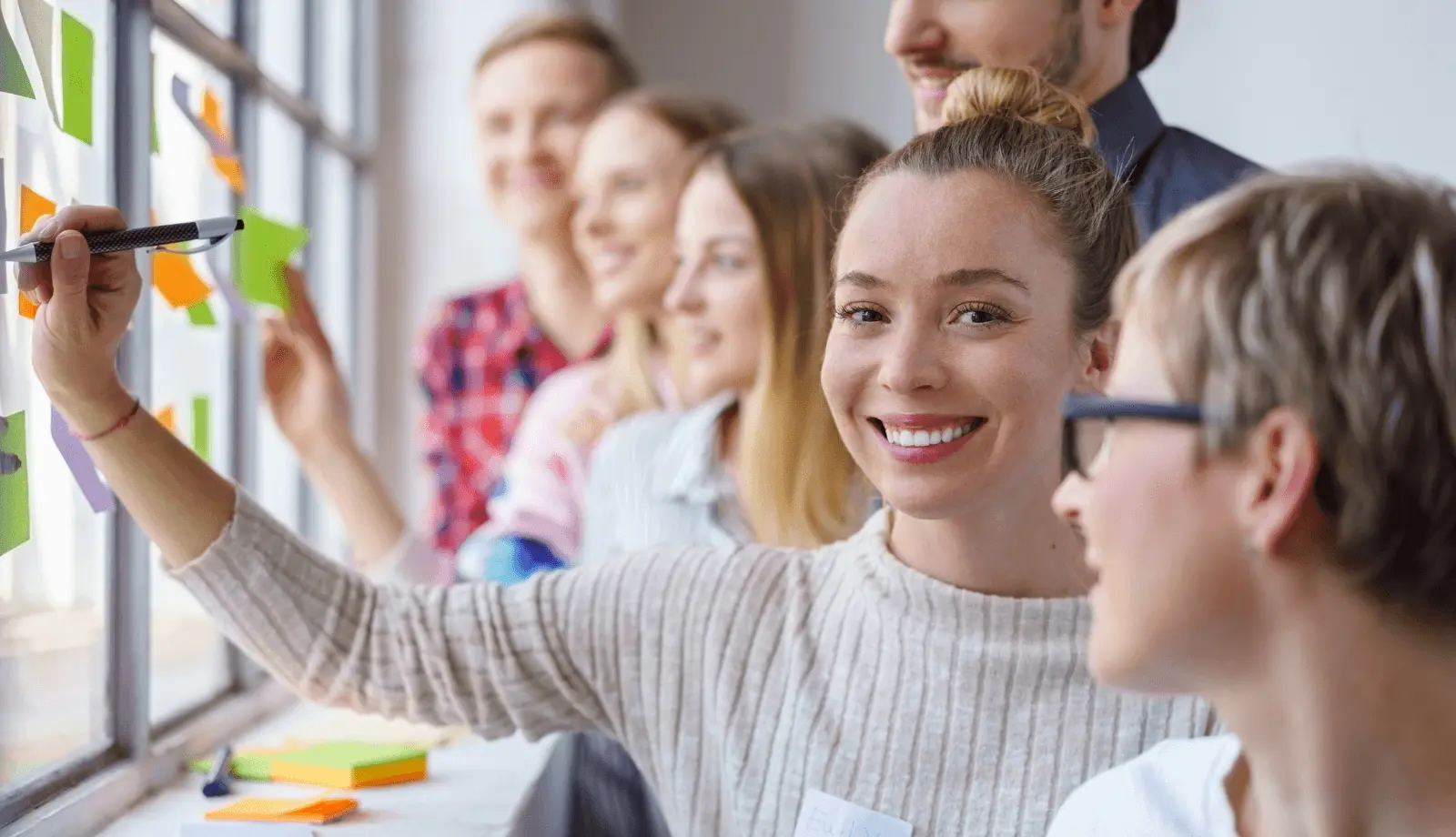 six people infront of an whiteboard