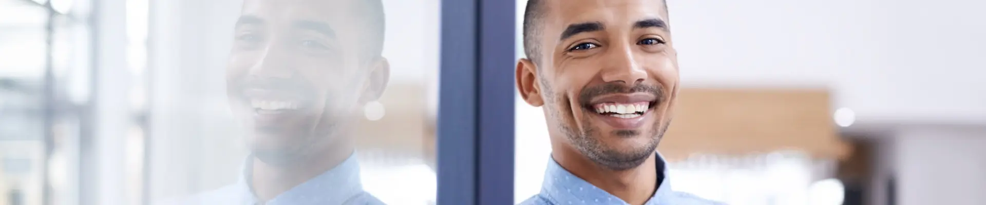 young man smiling at the camera