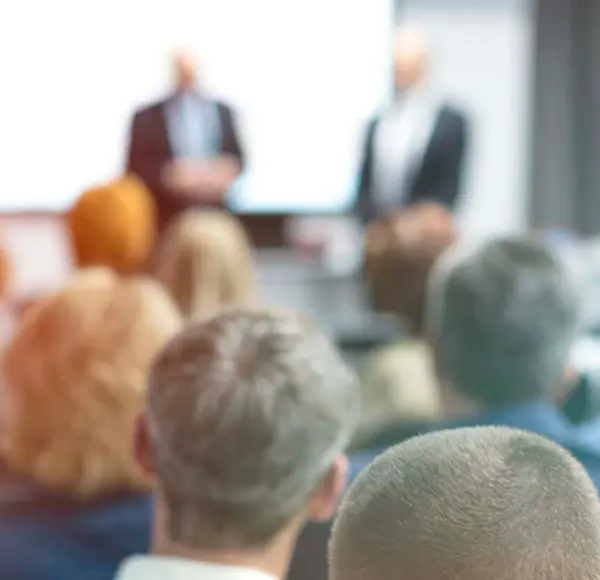 Audience listen to the speaker during his presentation 