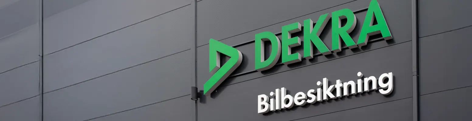 A person is leaning over a car engine with the hood open and looking at the engine. A person is leaning over a car engine with the hood open and looking at the engine.