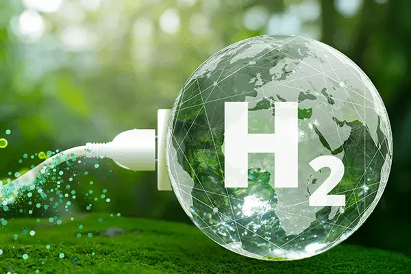En grön skog i bakgrunden med en symbol för H2 och vatten som sipprar ur synbolen. En grön skog i bakgrunden med en symbol för H2 och vatten som sipprar ur synbolen.