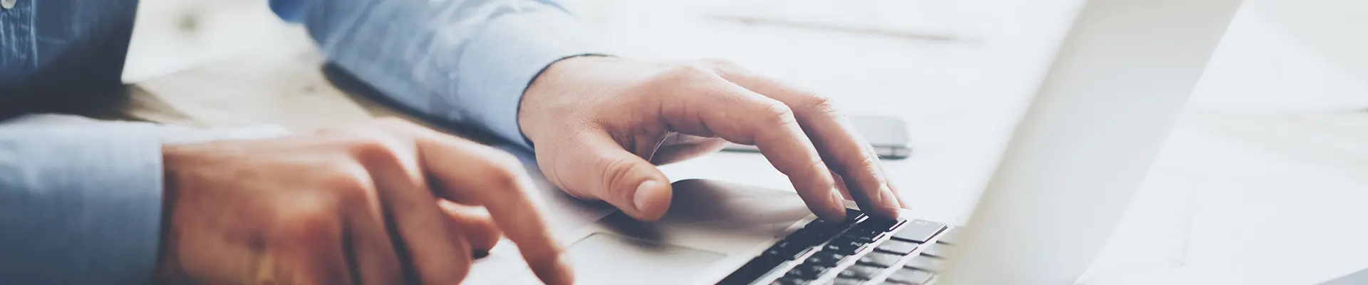 A man in a white hard hat, helmet, prepared for safety, exemplifying professionalism in a construction environment. 