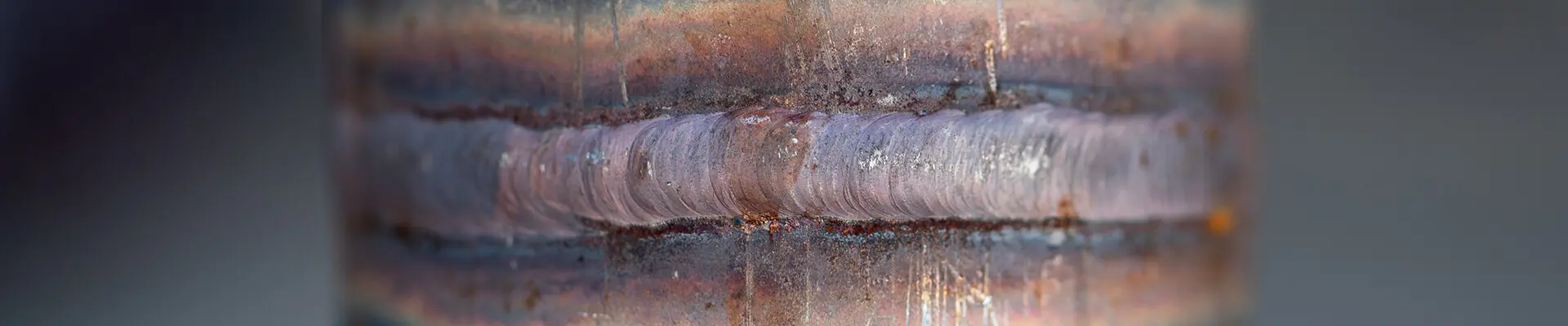 A pipe welded together around the pipe.
