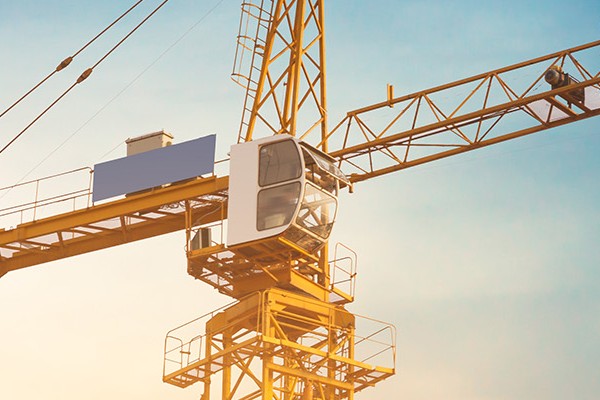 A crane, showcasing its structure against the skyline.