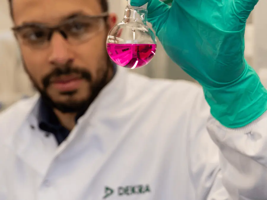 Man in holding a test tube 