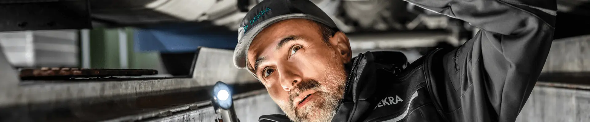 Man conduct a vehicle inspection